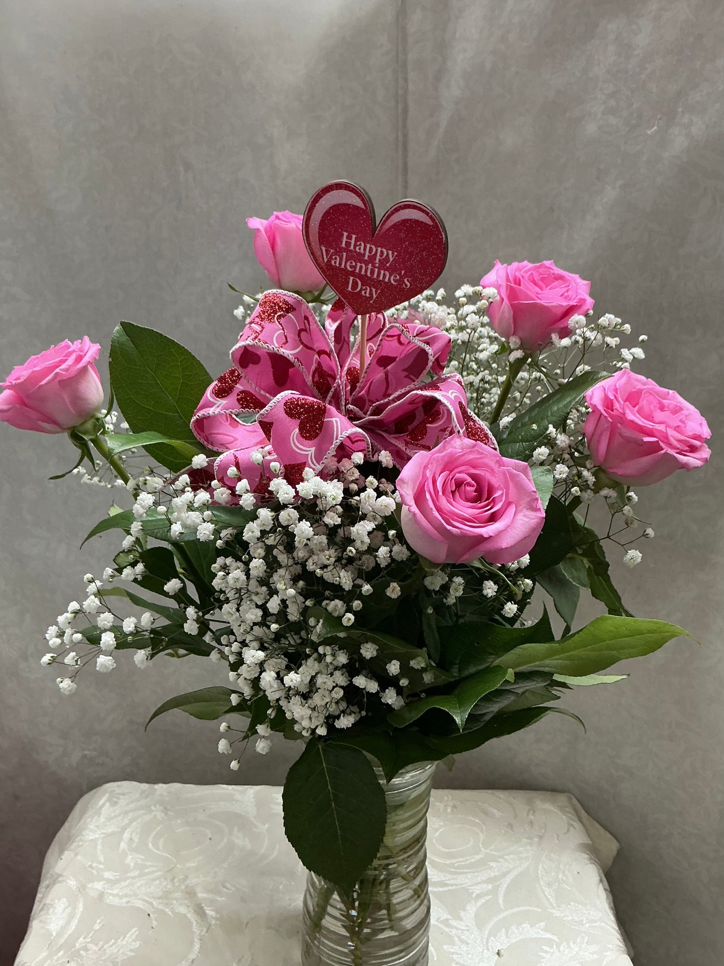 P6 6 Pink roses in a vase bb and greens – Pequa Park Florists Inc, Massapequa NY