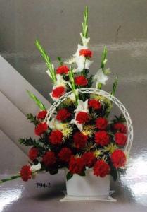 Sympathy red floor container – Pequa Park Florists Inc, Massapequa NY