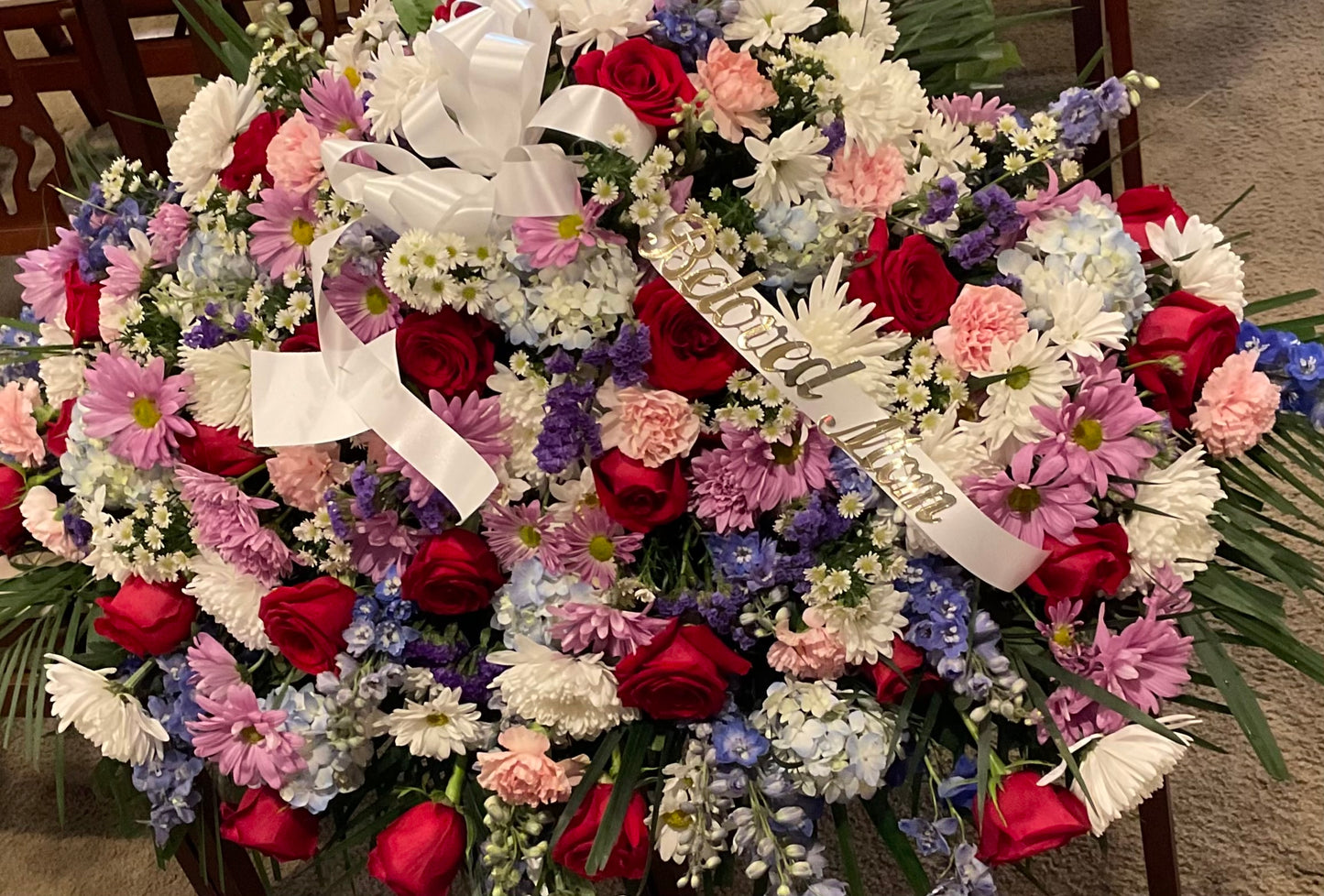 Pequa colorful casket cover – Pequa Park Florists Inc, Massapequa NY