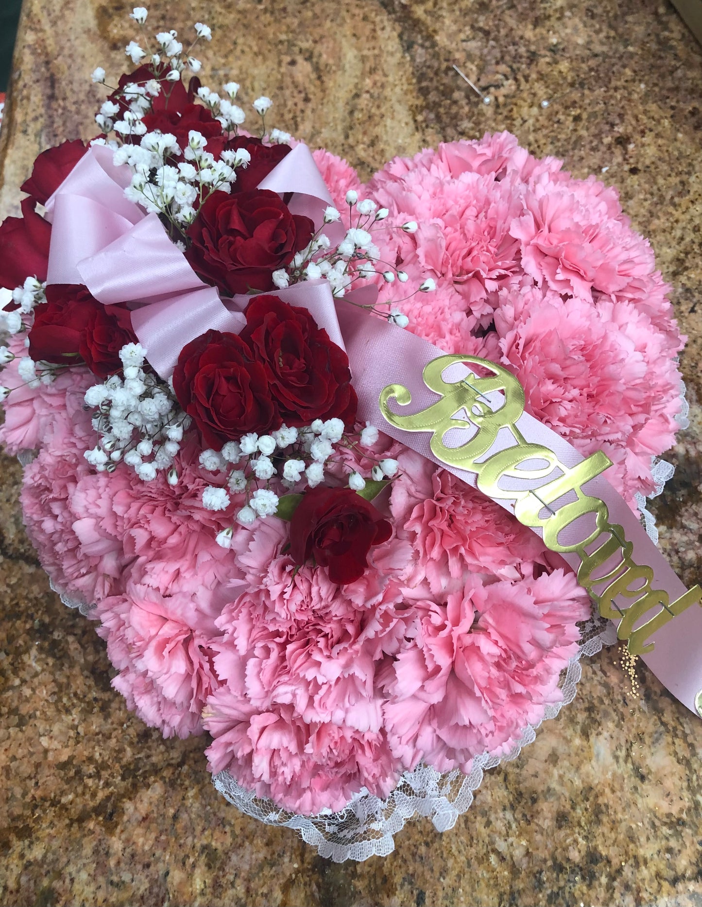 Pink carnations satin heart adornment – Pequa Park Florists Inc, Massapequa NY