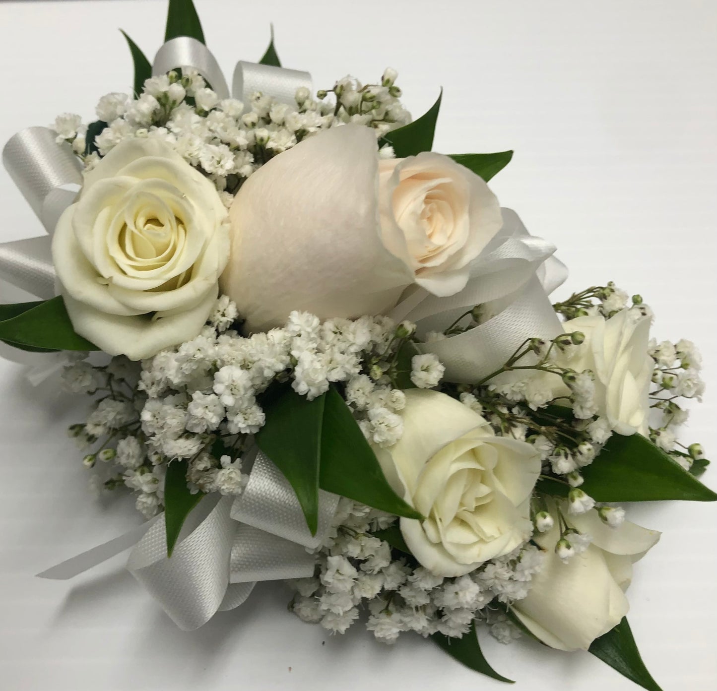 P white mixture of roses corsage – Pequa Park Florists Inc, Massapequa NY