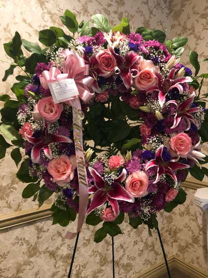 P PASTEL WREATH –  Pequa Park Florists Inc, Massapequa NY