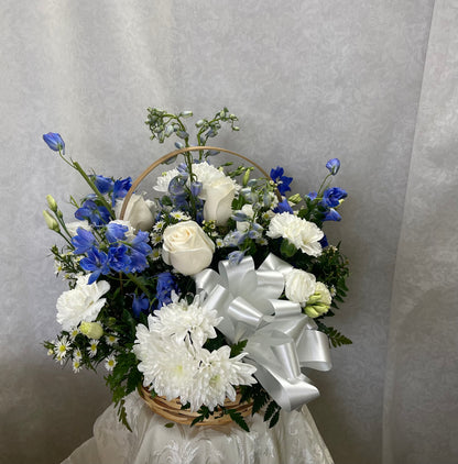 P Blue and white basket centerpiece –  Pequa Park Florists Inc, Massapequa NY