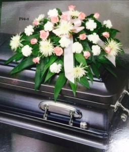 Sympathy pink and white casket spray